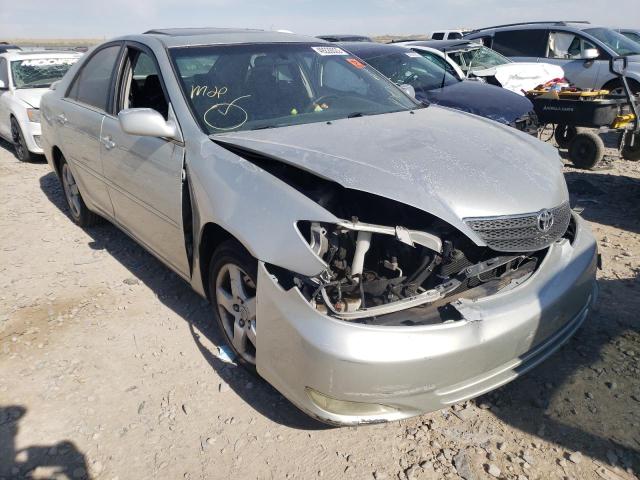 TOYOTA CAMRY LE 2003 with VIN 4T1BF30K23U561061 - Photo from auction