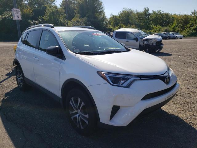 TOYOTA RAV4 LE 2018 with VIN 2T3BFREV2JW772240 - Photo from auction