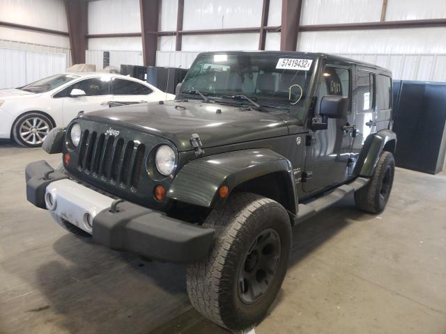Zdjęcie 2 z aukcji – 2011 JEEP WRANGLER U z VIN 1J4BA5H10BL557387