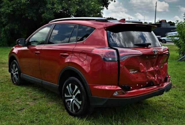 Photo 3 from auction – 2017 TOYOTA RAV4 LE with VIN JTMZFREV0HJ109837