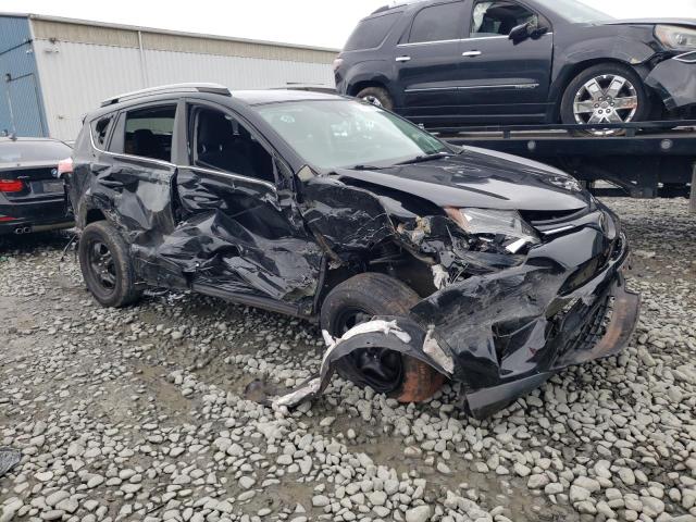 Photo 1 from auction – 2018 TOYOTA RAV4 LE with VIN 2T3BFREV8JW715444