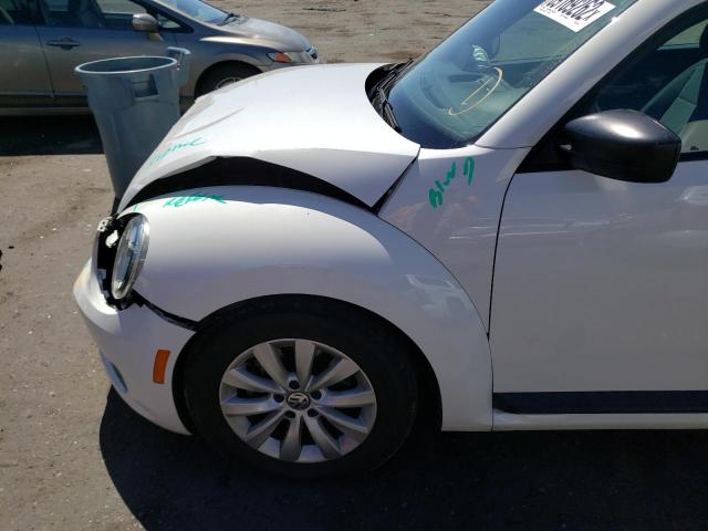Photo 9 from auction – 2013 VOLKSWAGEN BEETLE with VIN 3VWFP7AT2DM644218