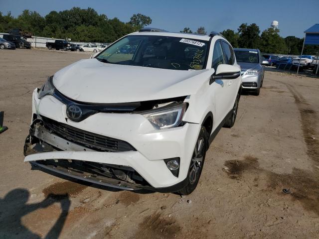 Photo 2 from auction – 2017 TOYOTA RAV4 XLE with VIN JTMWFREV3HJ716835