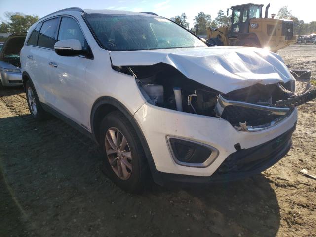 KIA SORENTO LX 2018 with VIN 5XYPGDA52JG374293 - Photo from auction