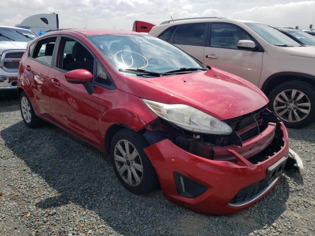 FORD FIESTA SE 2011 with VIN 3FADP4EJ1BM129893 - Photo from auction