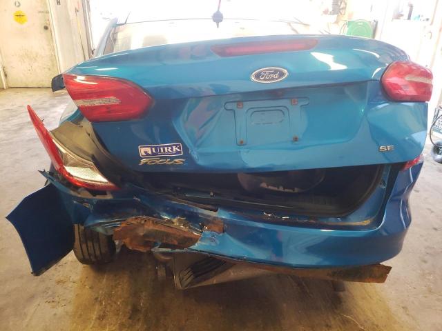 Photo 9 from auction – 2016 FORD FOCUS SE with VIN 1FADP3F21GL308607