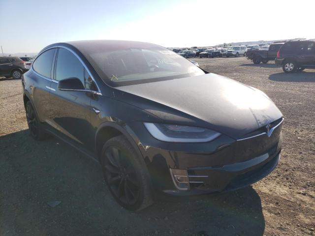 TESLA MODEL X 2018 with VIN 5YJXCAE27JF106499 - Photo from auction