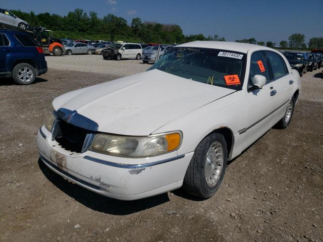 Photo 2 from auction – 1999 LINCOLN TOWN CAR E with VIN 1LNHM81W2XY708458