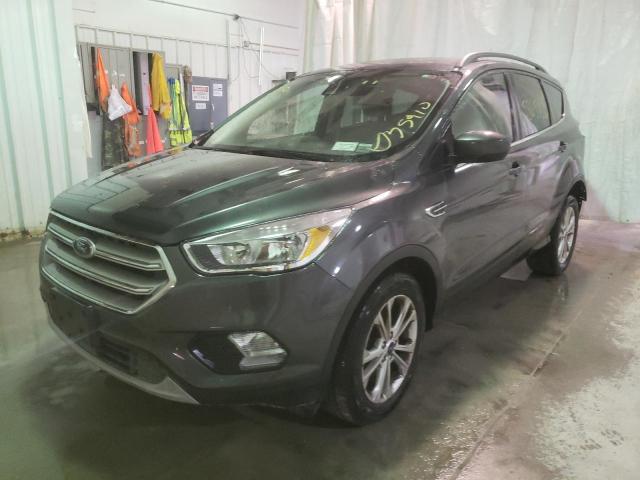 Photo 2 from auction – 2018 FORD ESCAPE SE with VIN 1FMCU0GD2JUD23031
