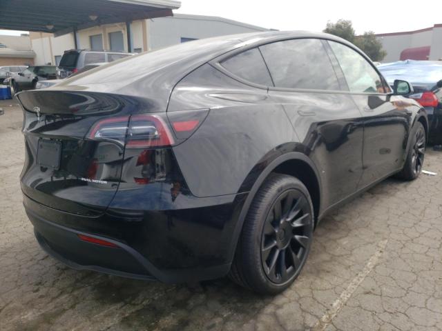 Photo 4 from auction – 2022 TESLA MODEL Y with VIN 7SAYGDEEXNF486791