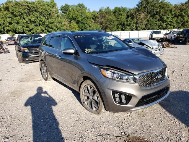 KIA SORENTO SX 2016 with VIN 5XYPKDA17GG014571 - Photo from auction