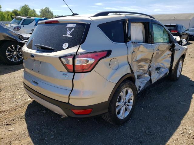 Photo 4 from auction – 2018 FORD ESCAPE SE with VIN 1FMCU0GD0JUB07257