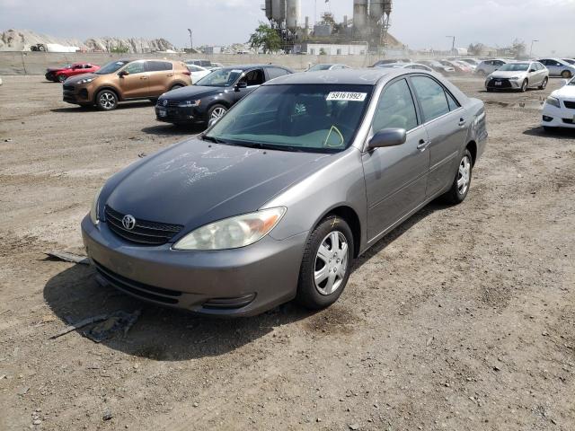 Photo 2 from auction – 2003 TOYOTA CAMRY LE with VIN JTDBE32K430159425