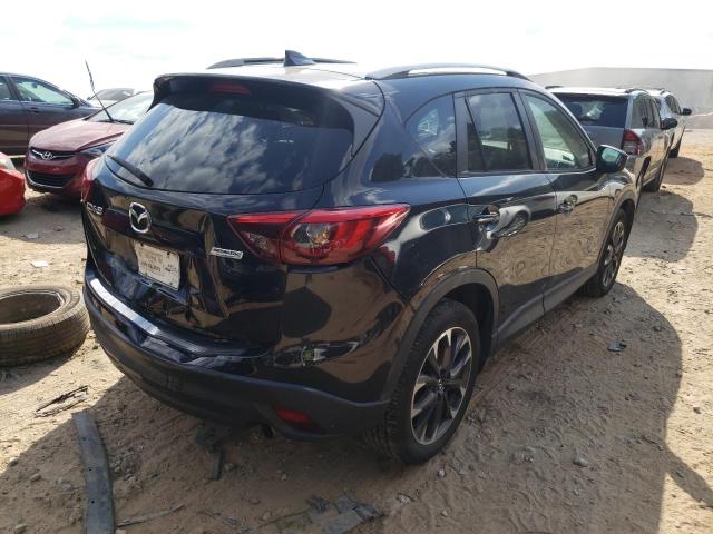 Photo 4 from auction – 2016 MAZDA CX-5 GT with VIN JM3KE2DY3G0787792