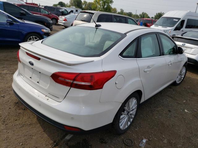 Photo 4 from auction – 2018 FORD FOCUS TITA with VIN 1FADP3J2XJL323671