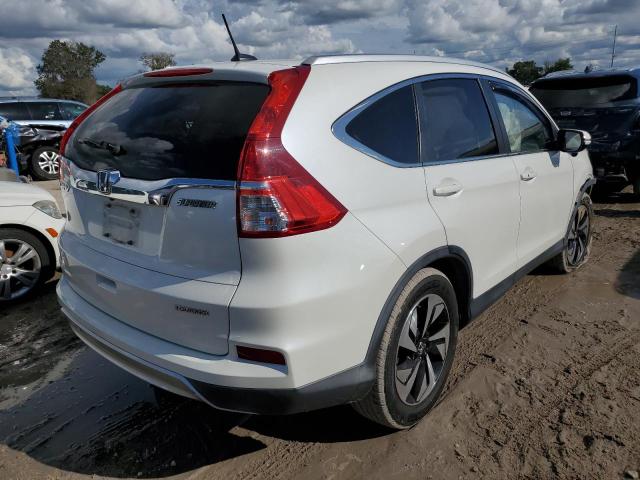 Photo 4 from auction – 2015 HONDA CR-V TOURI with VIN 5J6RM3H91FL008609