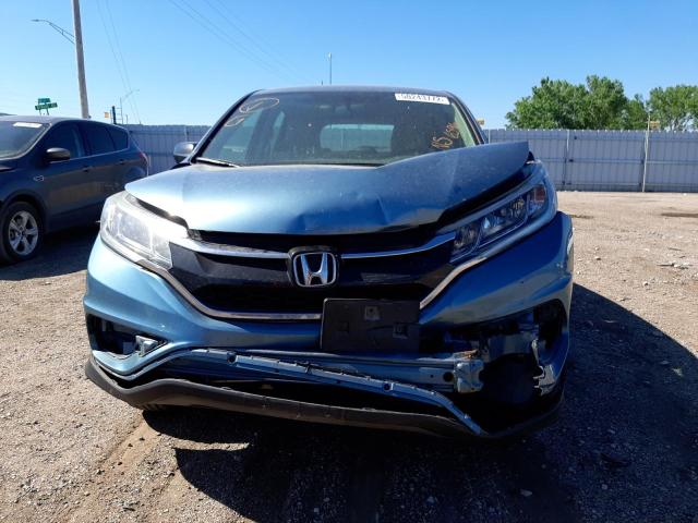 Photo 9 from auction – 2015 HONDA CR-V LX with VIN 2HKRM4H38FH636596