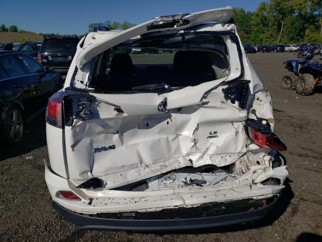 Photo 9 from auction – 2018 TOYOTA RAV4 LE with VIN 2T3BFREV4JW748943