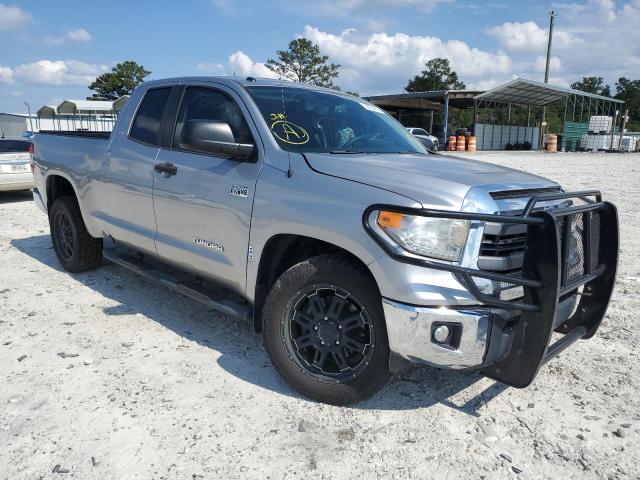 TOYOTA TUNDRA DOU 2014 with VIN 5TFRY5F14EX167781 - Photo from auction