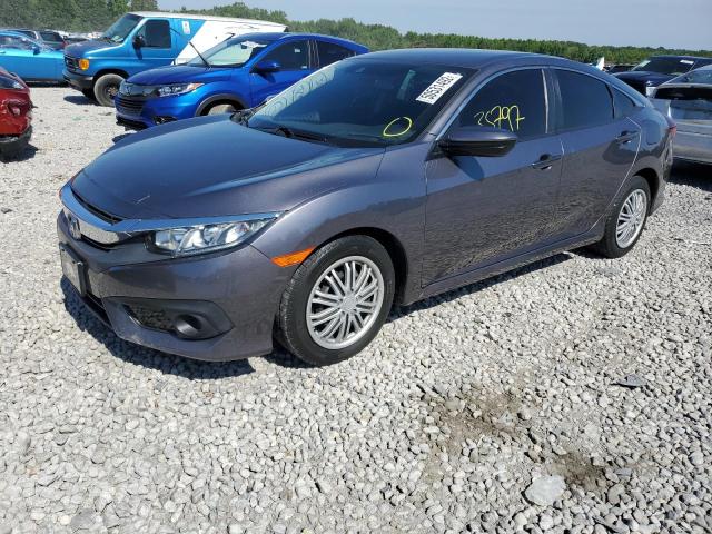 Photo 2 from auction – 2018 HONDA CIVIC LX with VIN 19XFC2F63JE039702