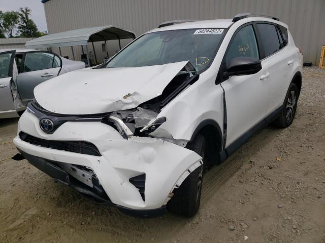 Photo 2 from auction – 2017 TOYOTA RAV4 LE with VIN 2T3BFREV6HW574657