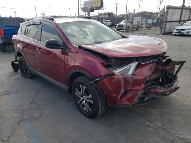 TOYOTA RAV4 LE 2018 with VIN 2T3ZFREV2JW490288 - Photo from auction
