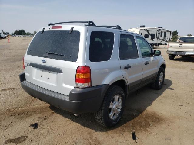 Photo 4 from auction – 2003 FORD ESCAPE XLT with VIN 1FMYU93173KB46013