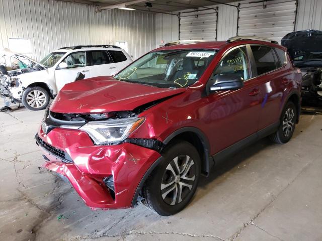 Photo 2 from auction – 2018 TOYOTA RAV4 LE with VIN 2T3BFREVXJW735243