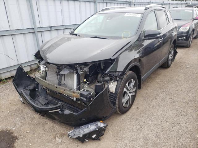 Photo 2 from auction – 2017 TOYOTA RAV4 LE with VIN 2T3ZFREV9HW402217