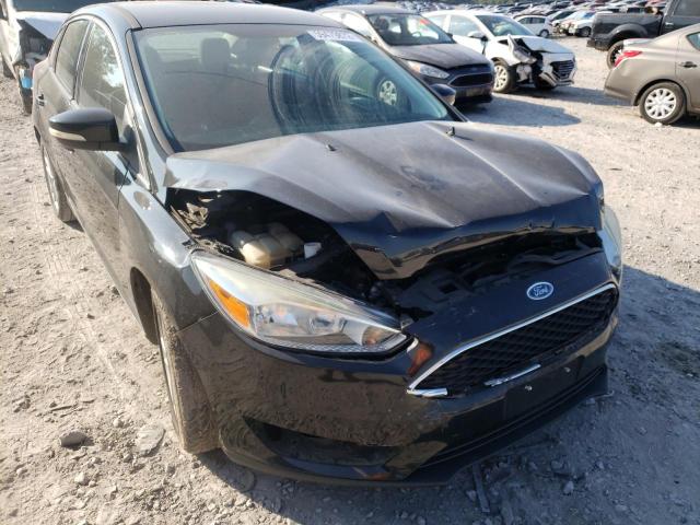 Photo 9 from auction – 2015 FORD FOCUS SE with VIN 1FADP3F25FL204412