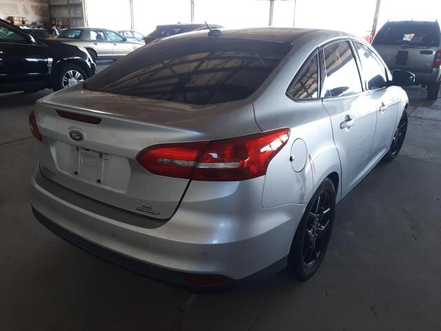 Photo 4 from auction – 2016 FORD FOCUS SE with VIN 1FADP3F24GL384094