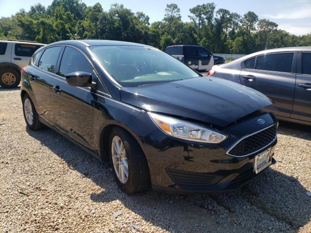 FORD FOCUS SE 2018 with VIN 1FADP3K21JL275394 - Photo from auction