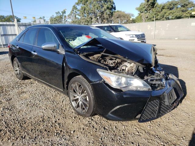 TOYOTA CAMRY LE 2016 with VIN 4T1BF1FKXGU199711 - Photo from auction