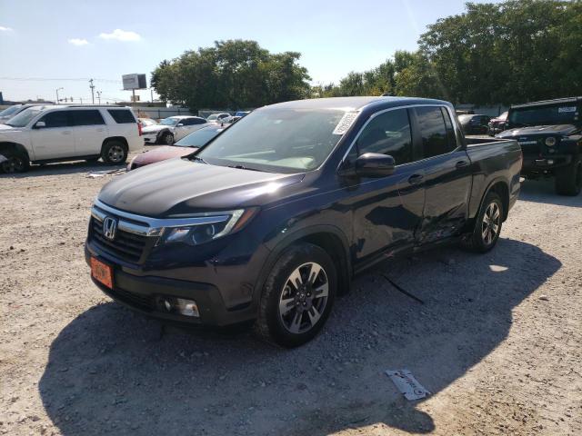 Photo 2 from auction – 2017 HONDA RIDGELINE with VIN 5FPYK2F60HB010679