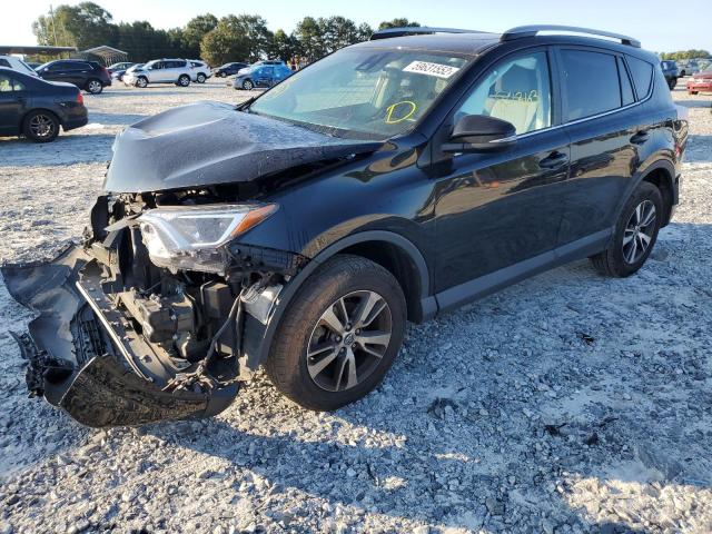 Photo 2 from auction – 2018 TOYOTA RAV4 with VIN 2T3WFREV3JW482963