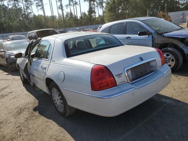 Photo 3 from auction – 2004 LINCOLN TOWN CAR E with VIN 1LNHM81W44Y640627