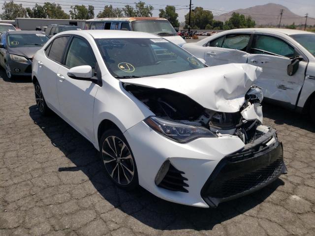 TOYOTA COROLLA L 2017 with VIN 5YFBURHE7HP580835 - Photo from auction