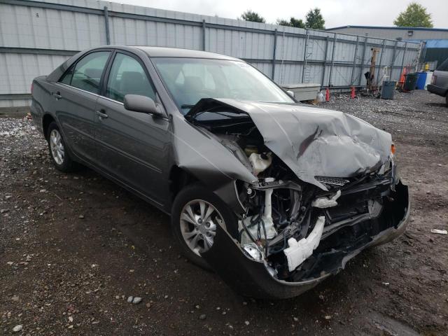 TOYOTA CAMRY LE 2004 with VIN 4T1BF30K94U586458 - Photo from auction