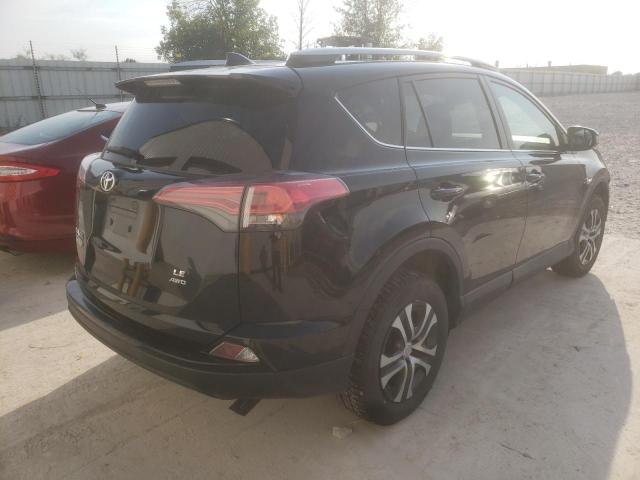 Photo 4 from auction – 2018 TOYOTA RAV4 LE with VIN 2T3BFREV4JW735898