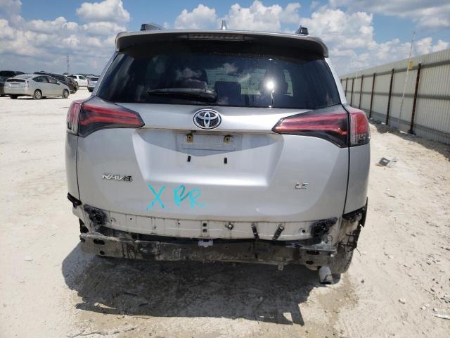 Photo 9 from auction – 2018 TOYOTA RAV4 LE with VIN 2T3ZFREV7JW511572
