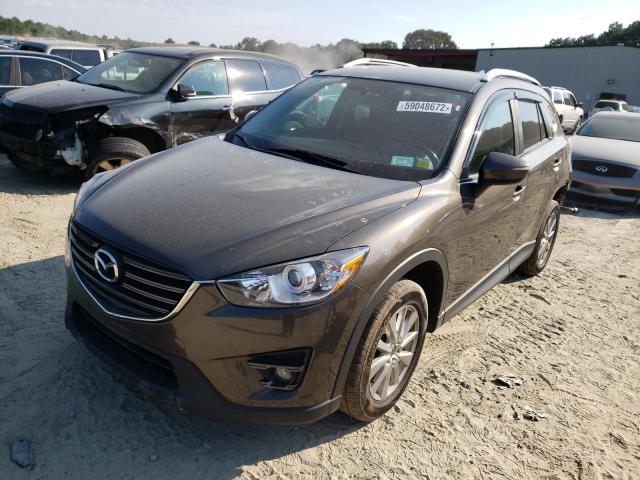 Photo 2 from auction – 2016 MAZDA CX-5 TOURI with VIN JM3KE4CY2G0879053
