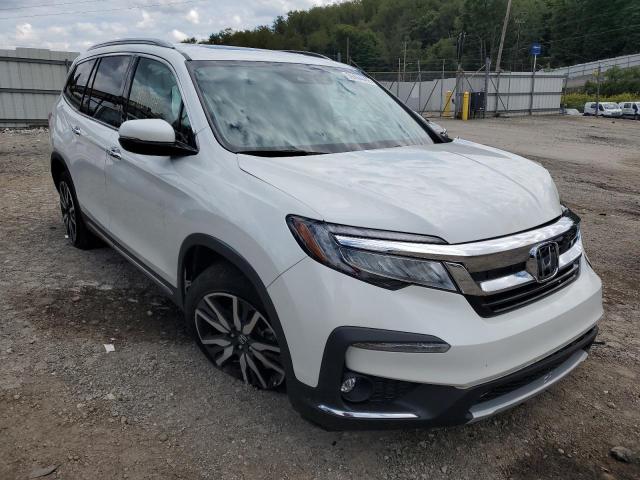 HONDA PILOT TOUR 2020 with VIN 5FNYF6H92LB048709 - Photo from auction
