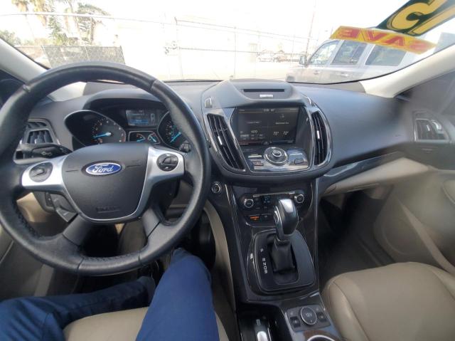 Photo 9 from auction – 2015 FORD ESCAPE TIT with VIN 1FMCU0J99FUA62749