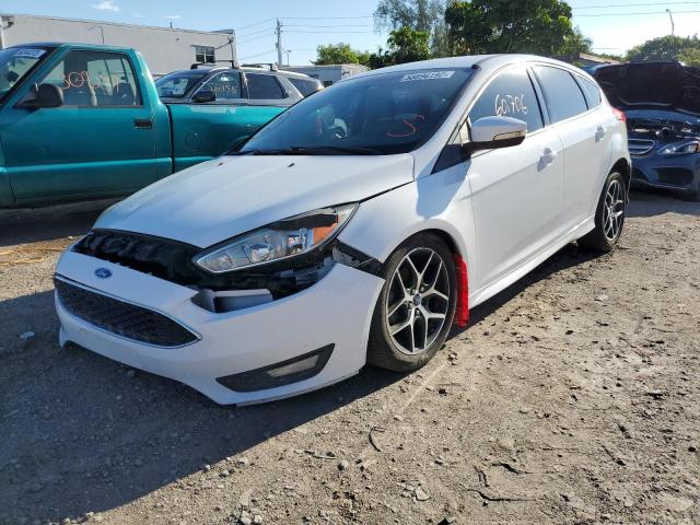 Photo 2 from auction – 2015 FORD FOCUS SE with VIN 1FADP3K22FL215471