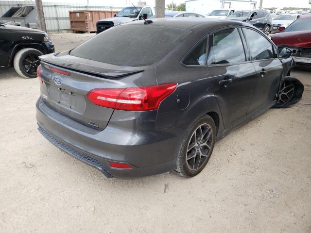 Photo 4 from auction – 2015 FORD FOCUS SE with VIN 1FADP3F20FL305664