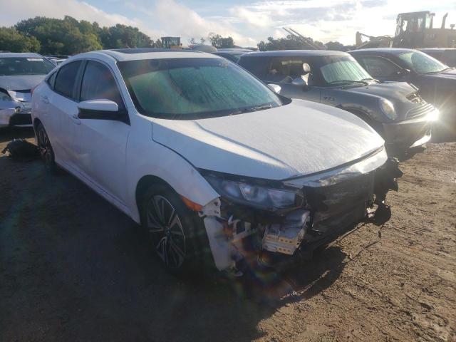 HONDA CIVIC EX 2018 with VIN JHMFC1F33JX033137 - Photo from auction
