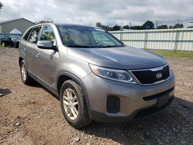 KIA SORENTO LX 2014 with VIN 5XYKTCA67EG427701 - Photo from auction