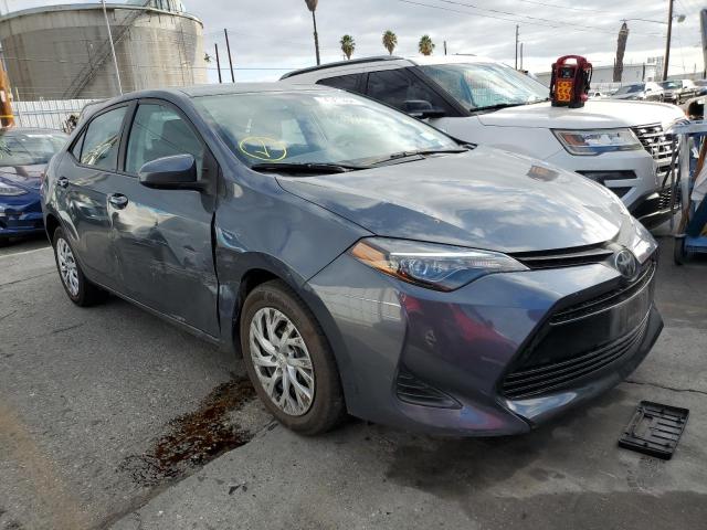 TOYOTA COROLLA L 2019 with VIN 5YFBURHE2KP885733 - Photo from auction