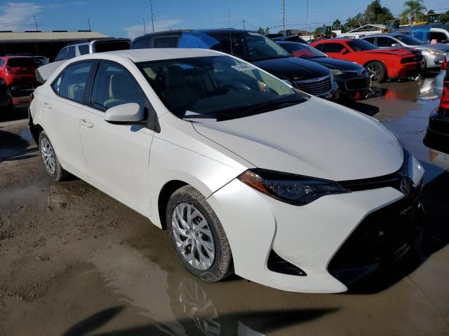 TOYOTA COROLLA L 2017 with VIN 5YFBURHE4HP600572 - Photo from auction