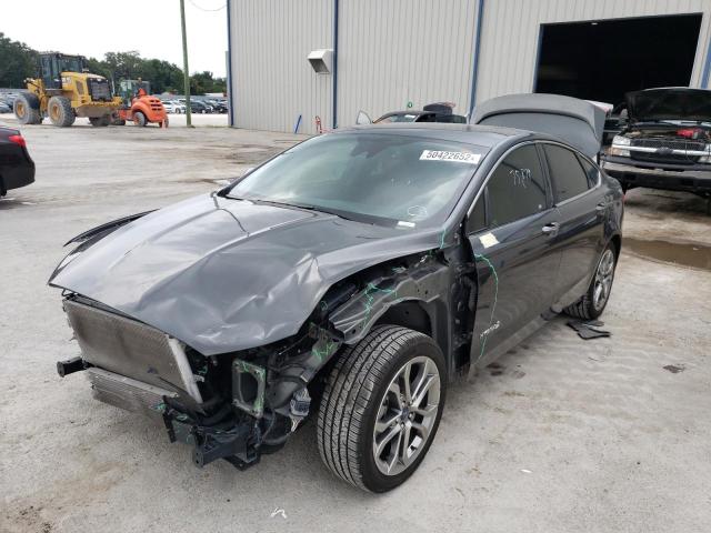 Photo 2 from auction – 2019 FORD FUSION TIT with VIN 3FA6P0RU9KR138768